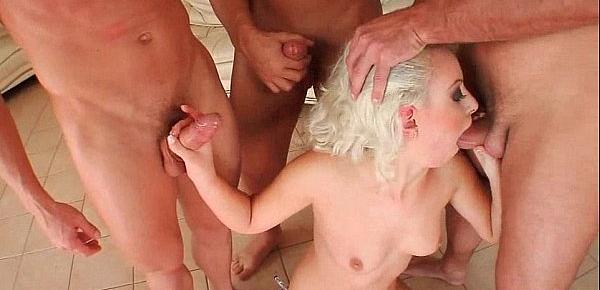  Four men gangbang a stunny blond milf